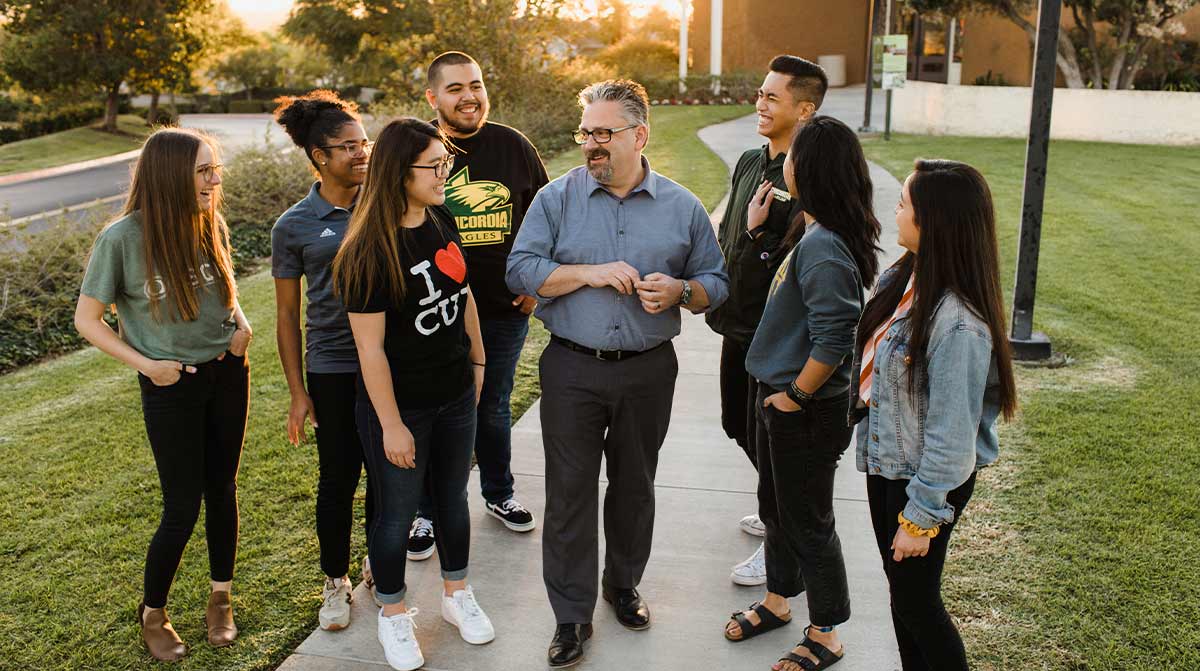 President Thomas with students
